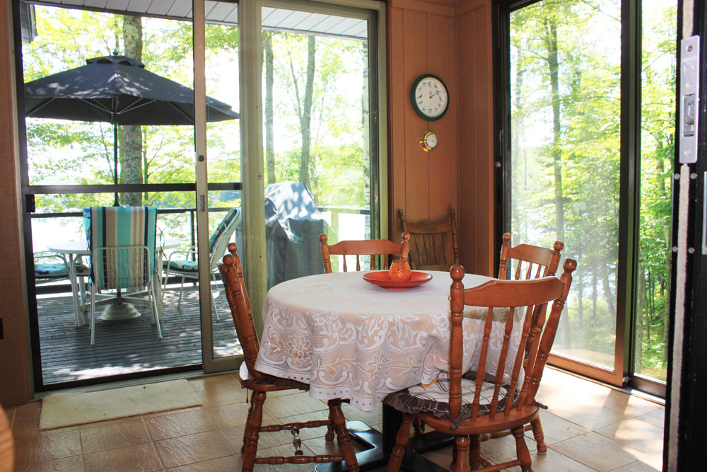 Spruce Lake Tranquility - Front-sunroom-dining-area