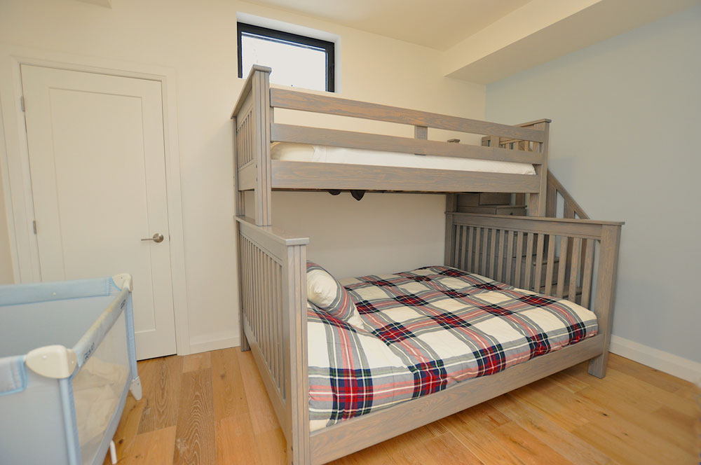 Growler Lake Deerwood Retreat - Bedroom 3 - Queen plus Single Bunk and crib