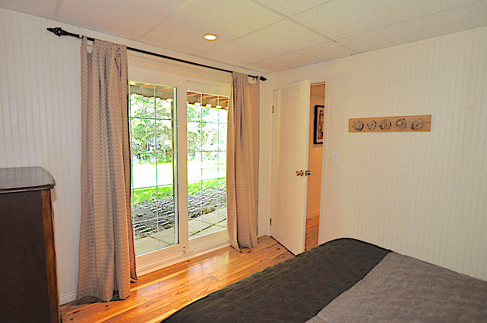 Kennisis Lake Paradise Bay - Lower Level Bedroom with Walkout View 2