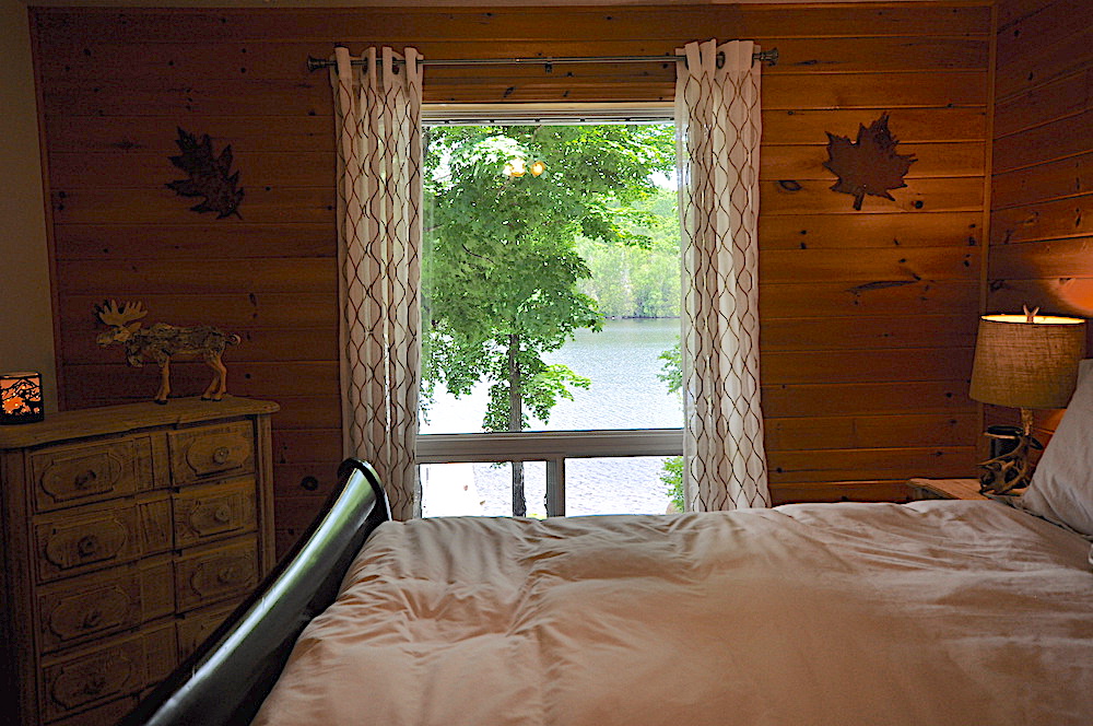 Monmouth Lake The Wandering Moose - Haliburton Cottage - Main Floor Bedroom 1 - View to Lake