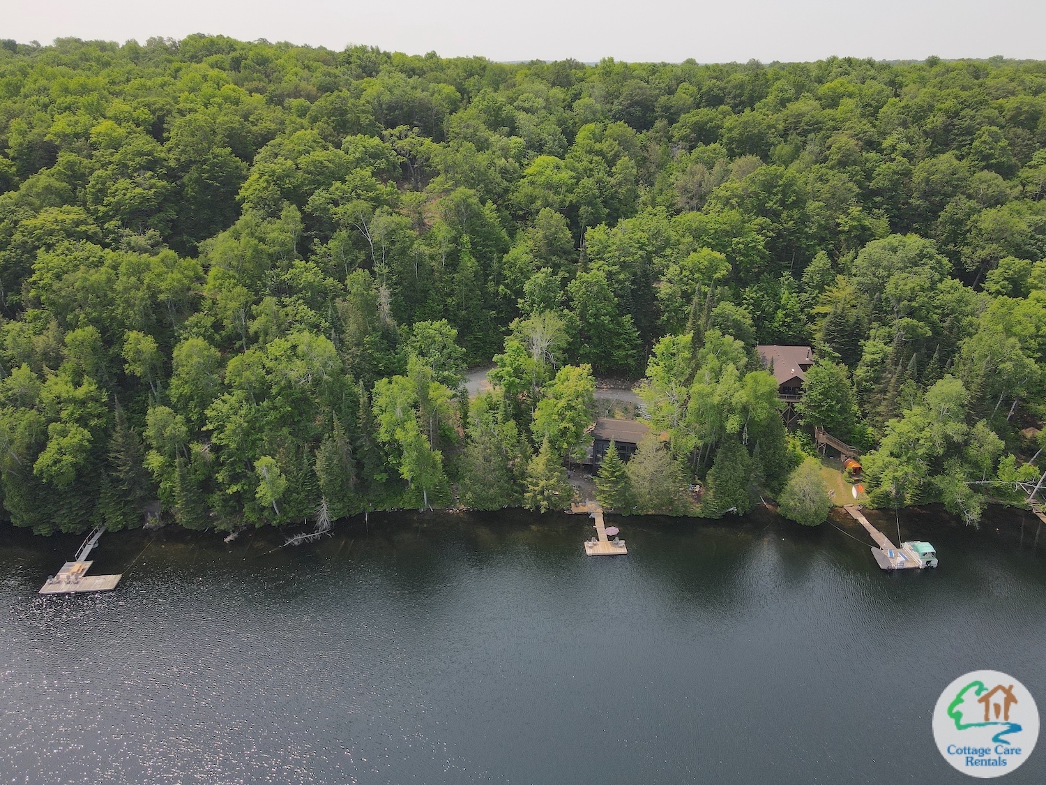 Miskwabi Lake By the Shore - Aerial view of Cottage and Waterfront