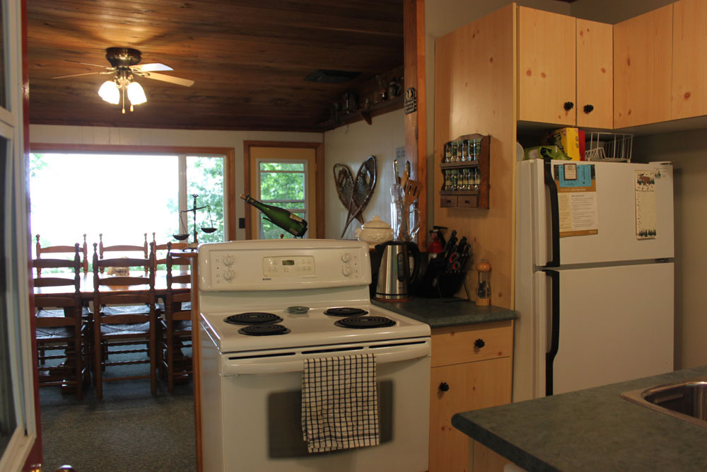 Haliburton Cottage - Kennisis Lake Sunset Vista - Kitchen view to dining