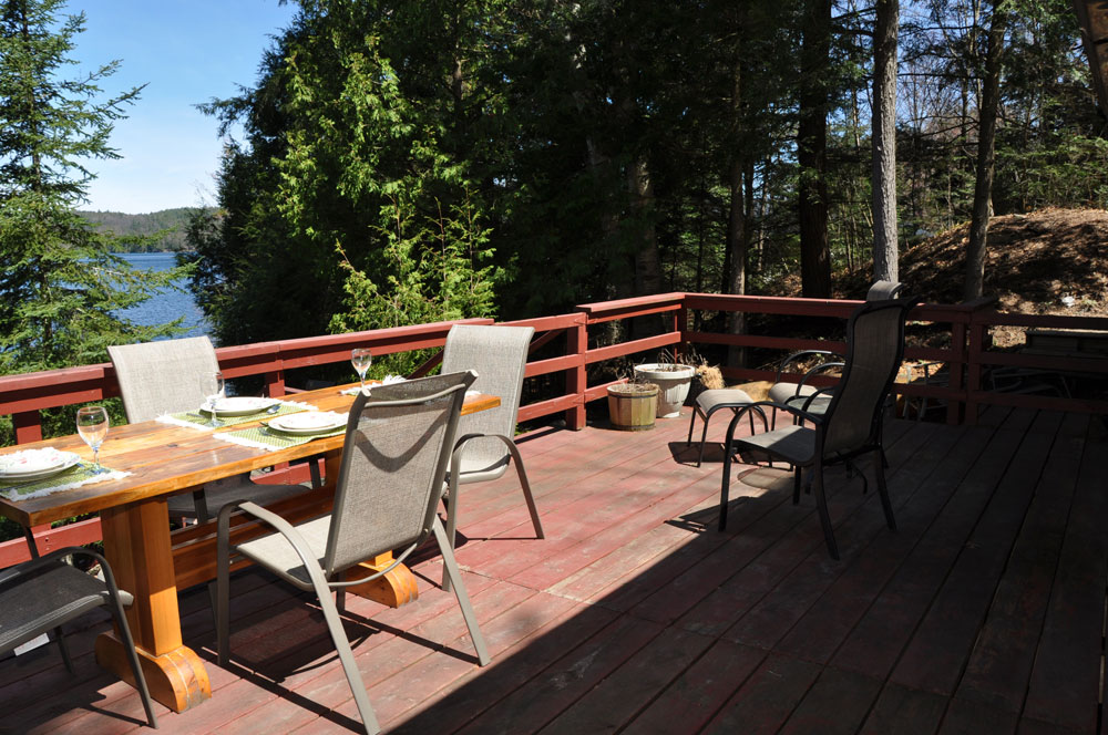 Haliburton Cottage on Big Hawk Lake - Dining on the deck with beautiful lake view