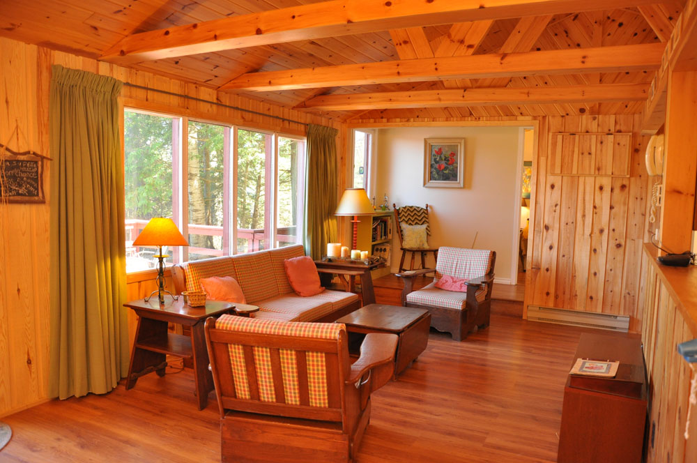 Haliburton Cottage on Big Hawk Lake- Open ceiling pine living room